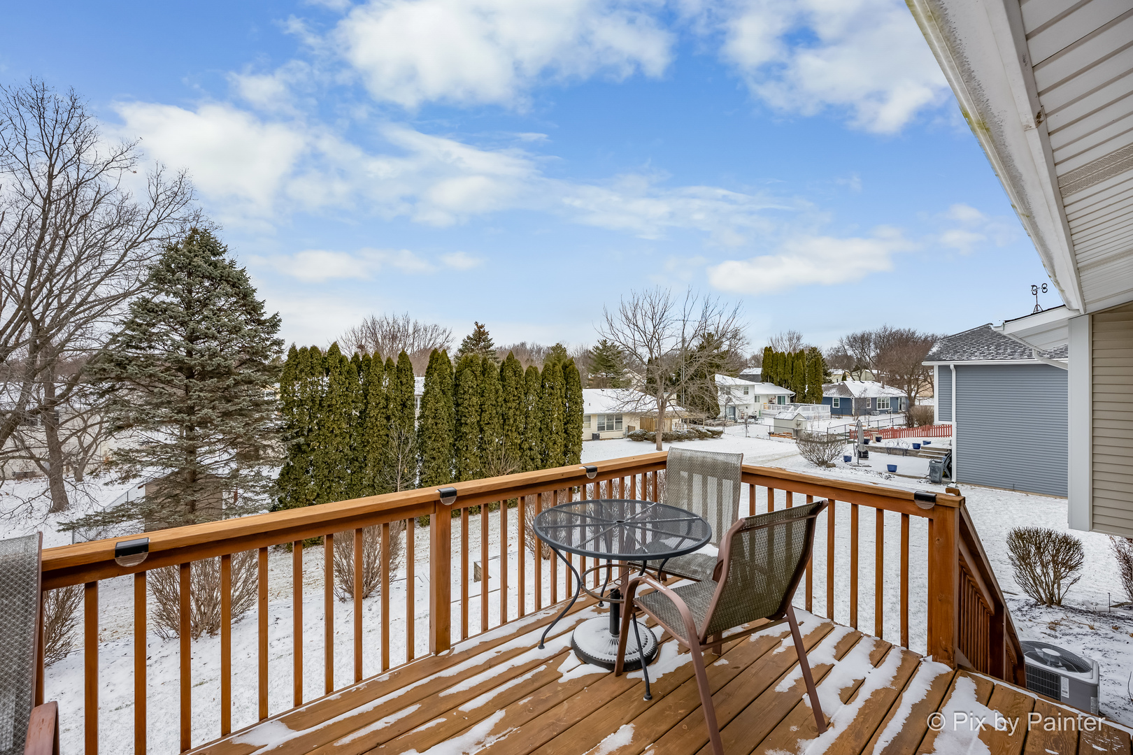 730 Chestnut Court Algonquin, IL 60102 - Photo 7 of 36 a view of a balcony with wooden floor and fence