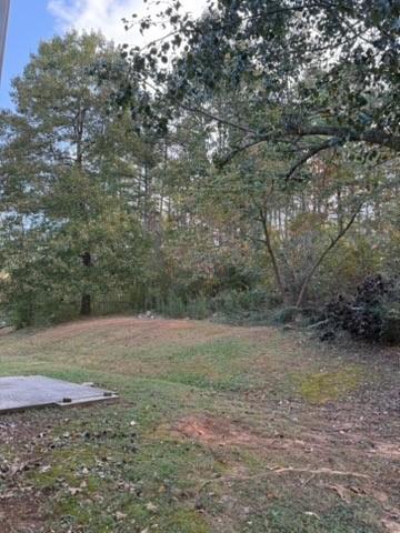 39 North Ridge Drive Northwest Adairsville, GA 30103 - Photo 24 of 25 a view of a field with trees in background