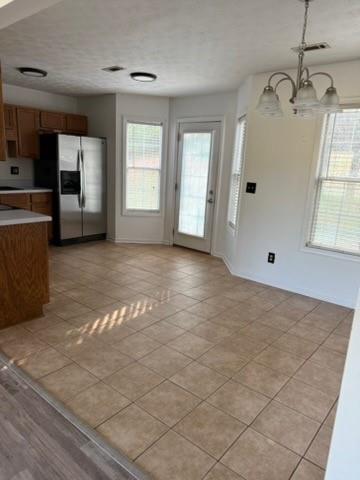 39 North Ridge Drive Northwest Adairsville, GA 30103 - Photo 8 of 25 a view of a big room with windows and chandelier