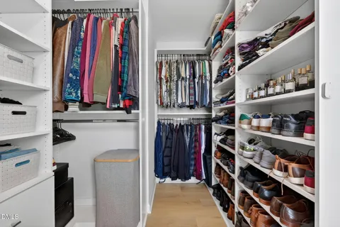 a bathroom with a shower and a sink