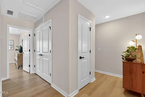 a living room with furniture a rug and a window