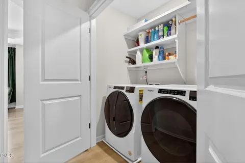 a bathroom with a sink toilet and a mirror