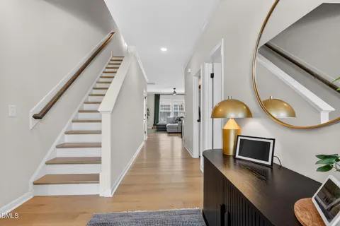 a view of hall way with furniture