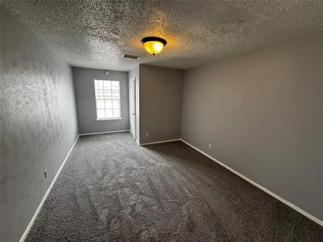 a bathroom with a tub and a sink