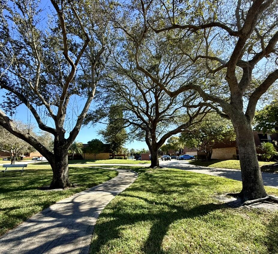 512 5th Lane Greenacres, FL 33463 - Photo 34 of 34 Tree-Lined Path
