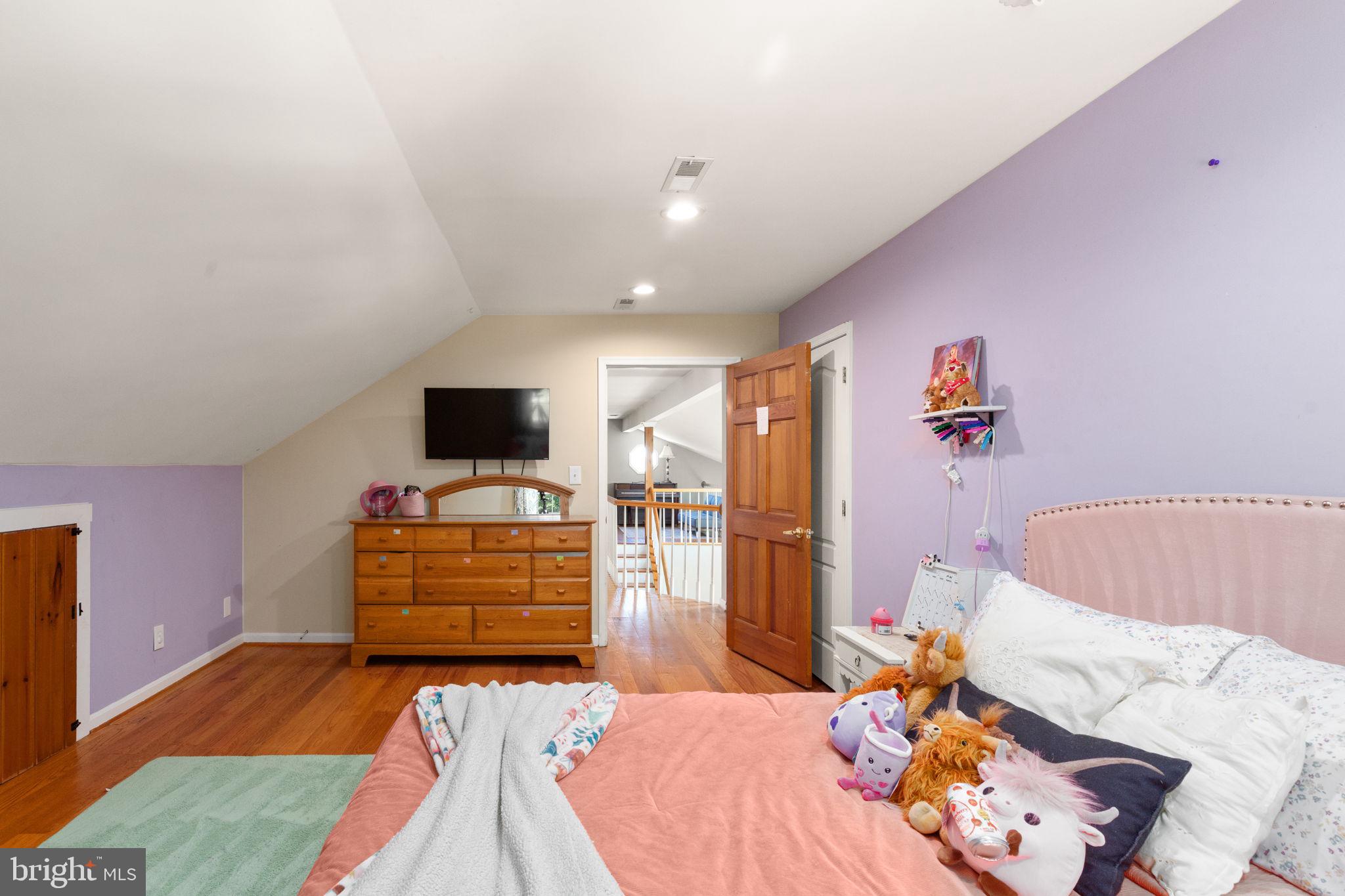 2140 Marston Road New Windsor, MD 21776 - Photo 27 of 48 a bedroom with a bed and flat screen tv