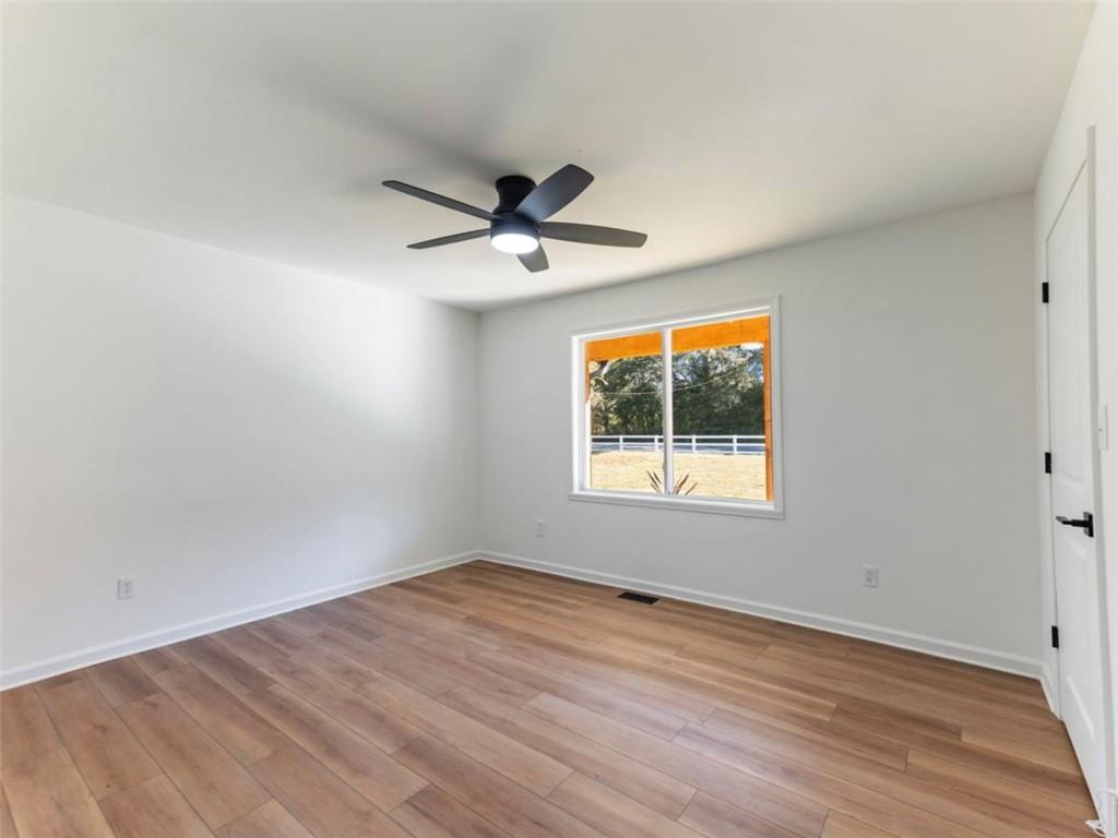 1328 Jefferson Highway Winder, GA 30680 - Photo 33 of 64 a view of an empty room with a window