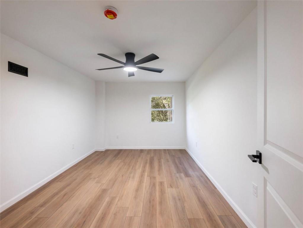 1328 Jefferson Highway Winder, GA 30680 - Photo 44 of 64 wooden floor in an empty room