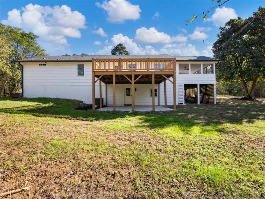 1328 Jefferson Highway Winder, GA 30680 - Photo 59 of 64 a view of a house with a yard