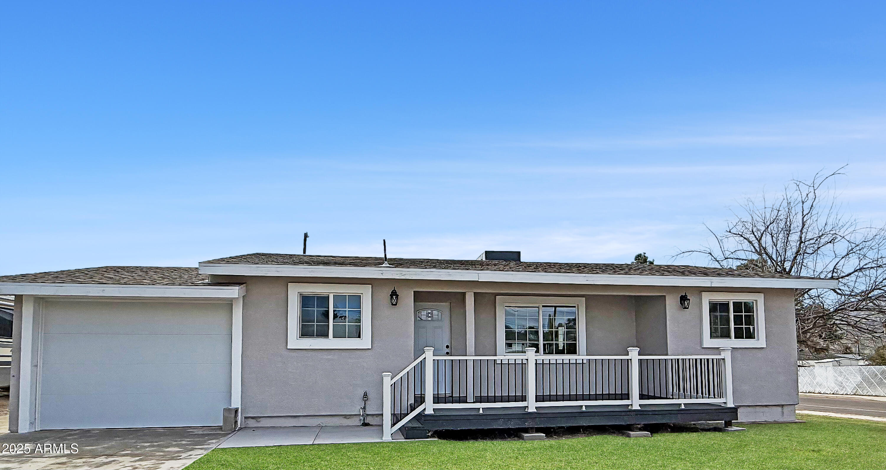 217 Fairhaven Road Kearny, AZ 85137 - Photo 1 of 13 a front view of a house with a garden
