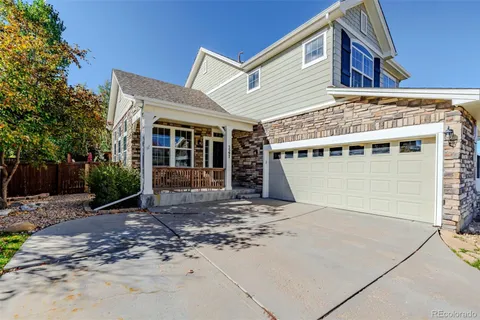 a spacious bathroom with a double vanity sink and a mirror