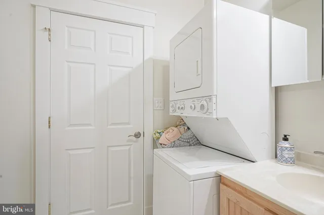a bathroom with a sink and vanity