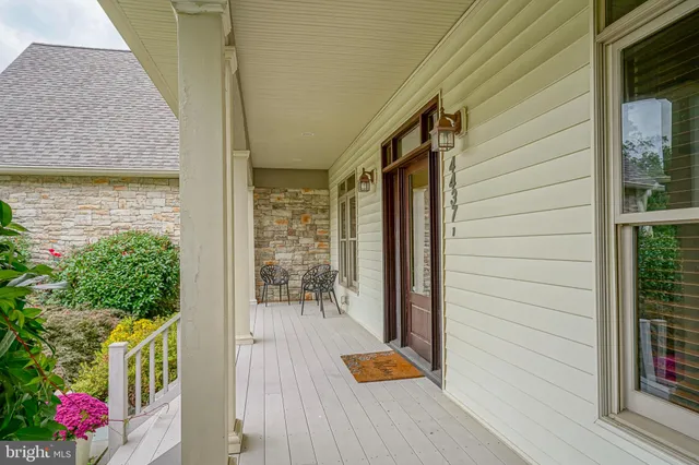 a porch with seating space