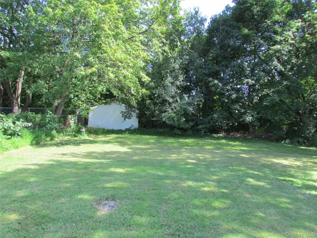 a fire hydrant in the middle of a field