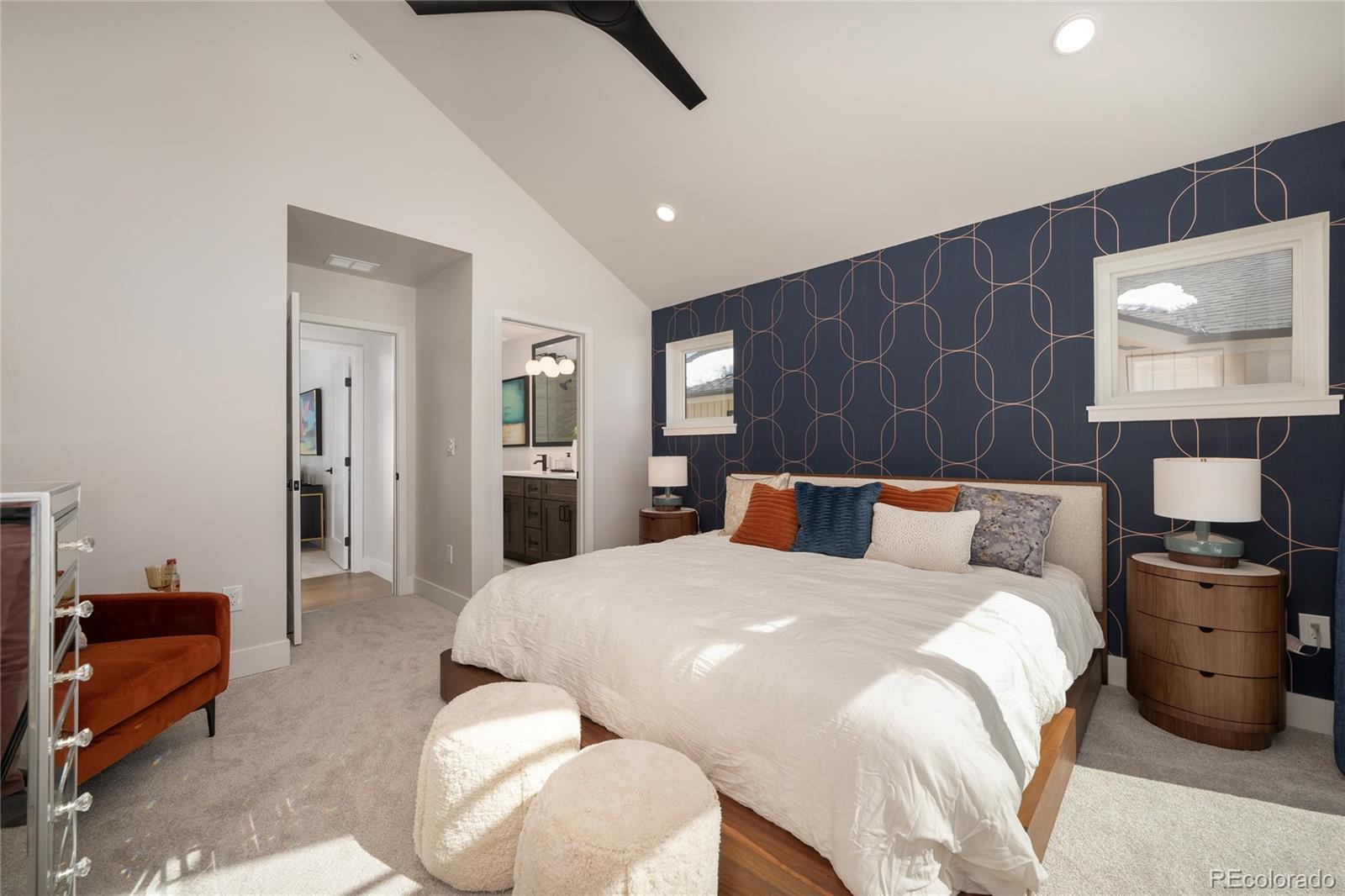 34 Wheeler Road Winter Park, CO 80482 - Photo 26 of 50 a bedroom with a bed and wooden floor