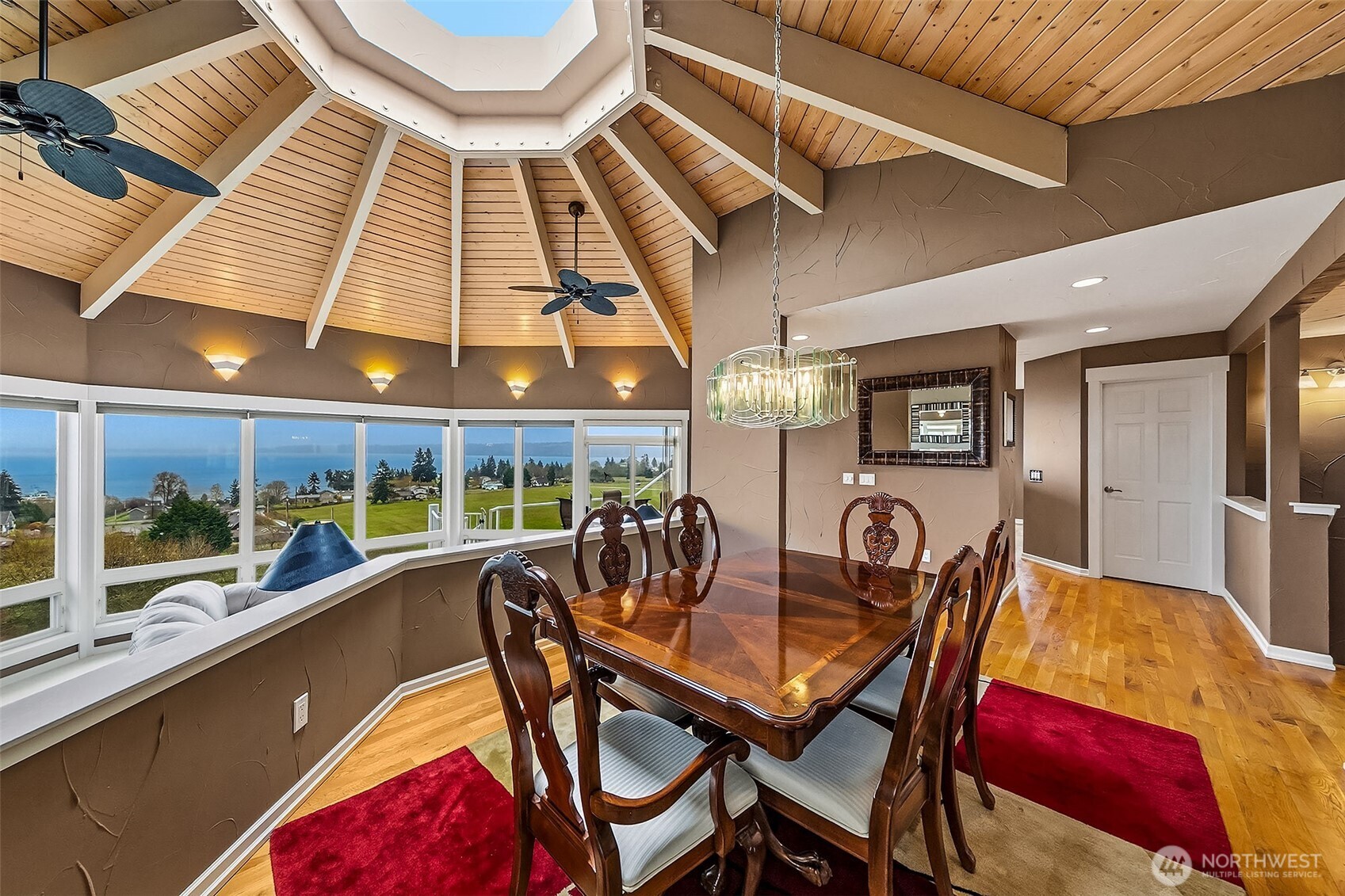6595 Anderson Road Clinton, WA 98236 - Photo 15 of 40 a dining room with furniture and window