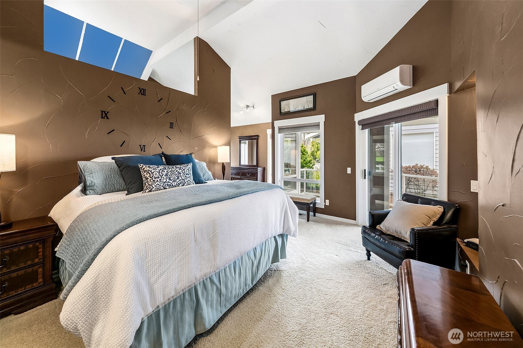 6595 Anderson Road Clinton, WA 98236 - Photo 24 of 40 a bedroom with bed and wooden floor