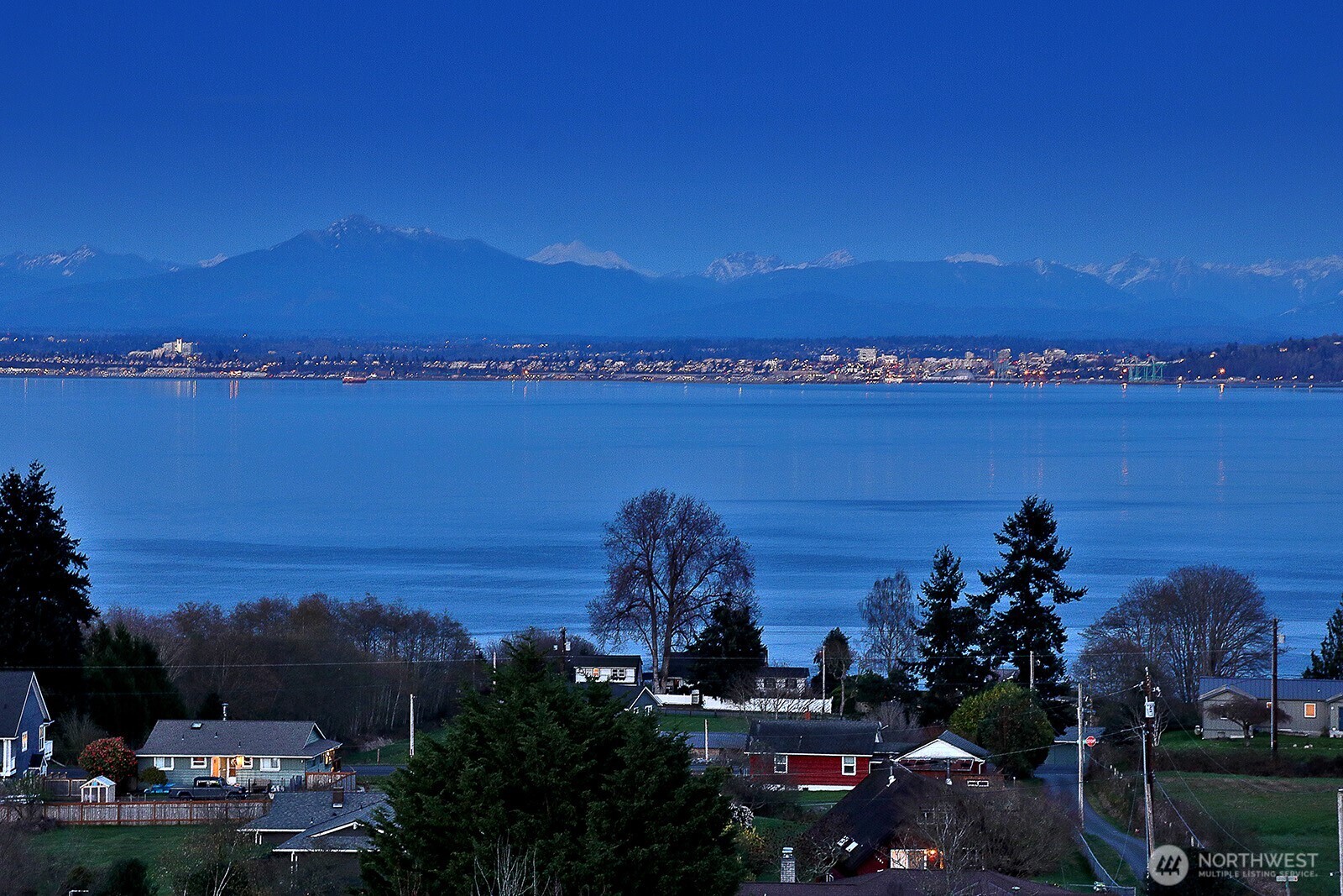 6595 Anderson Road Clinton, WA 98236 - Photo 7 of 40 a view of a city and ocean view