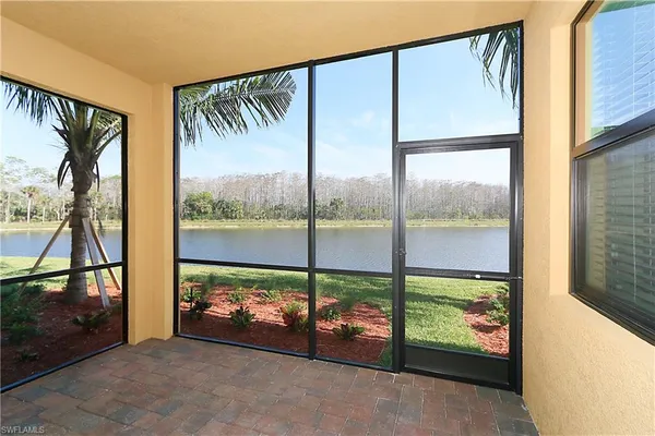 a view of a room with a large window