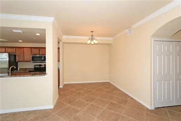 a view of a kitchen with a sink