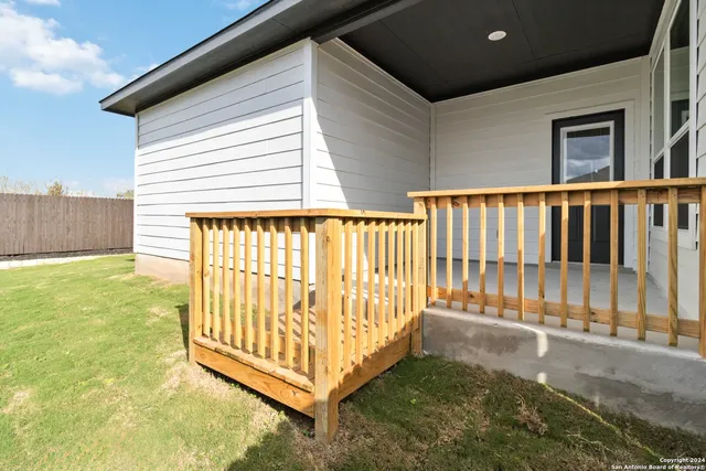 a view of a porch with a backyard