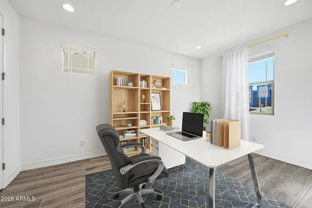 a workspace with furniture and a window