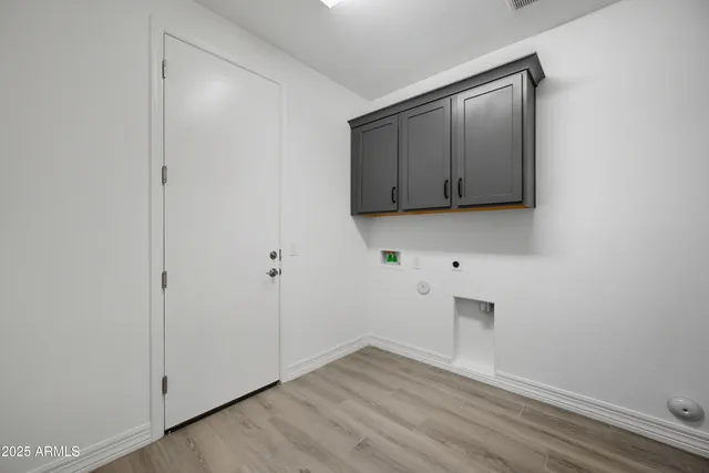 a view of room with hardwood floor