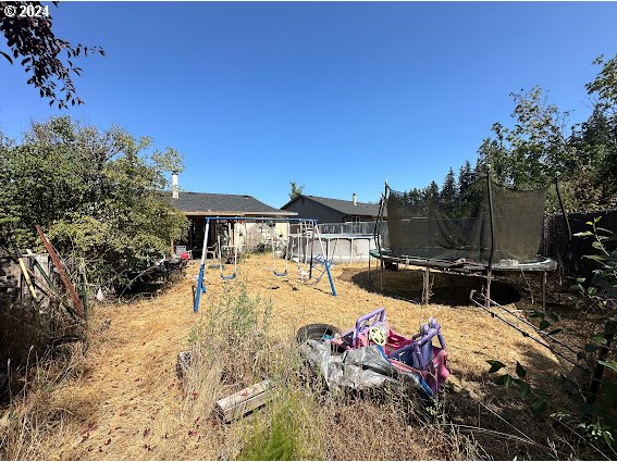 4847-4849 Elderberry Loop Springfield, OR 97478 - Photo 15 of 23 a view of a backyard with a patio