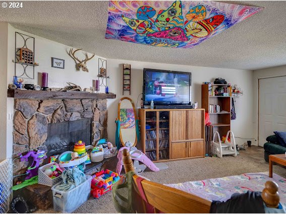 4847-4849 Elderberry Loop Springfield, OR 97478 - Photo 21 of 23 a bedroom with furniture and a bed