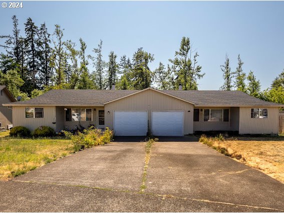 4847-4849 Elderberry Loop Springfield, OR 97478 - Photo 6 of 23 a view of a house with a yard