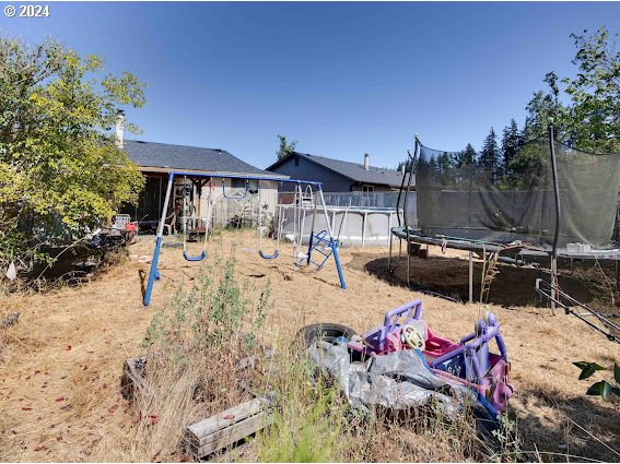 4847-4849 Elderberry Loop Springfield, OR 97478 - Photo 7 of 23 a view of outdoor space yard deck patio and fire pit