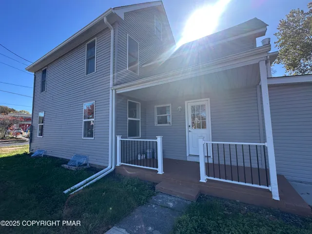 a kitchen with stainless steel appliances granite countertop a refrigerator sink and cabinets