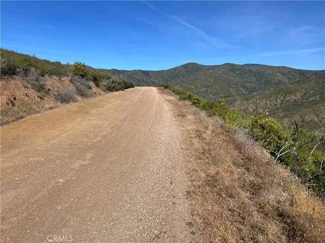 a view of mountain with lake view