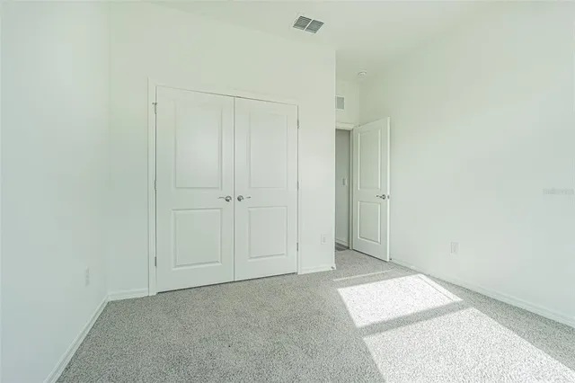 a bathroom with a shower and a toilet