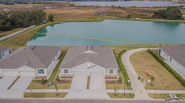 a view of a swimming pool with a lake view