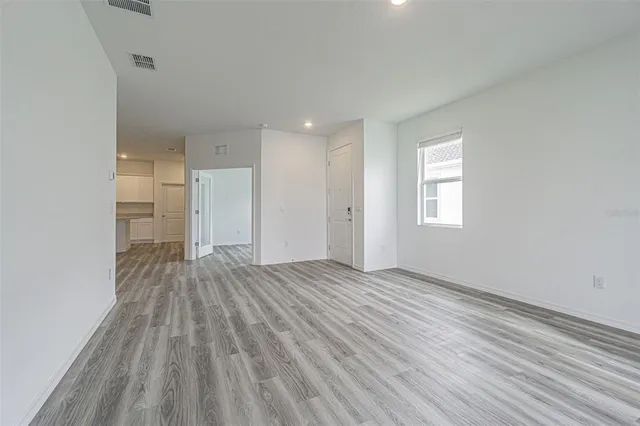 a view of an empty room and window