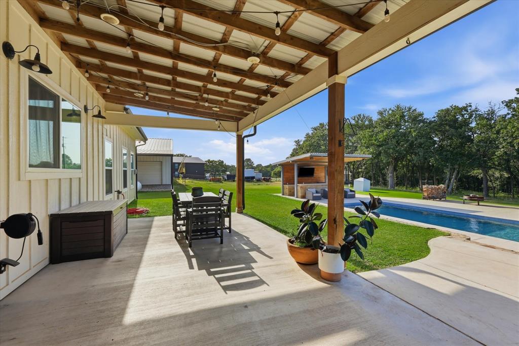 596 County Road 4668 Rhome, TX 76078 - Photo 29 of 40 Texas Sized back porch!