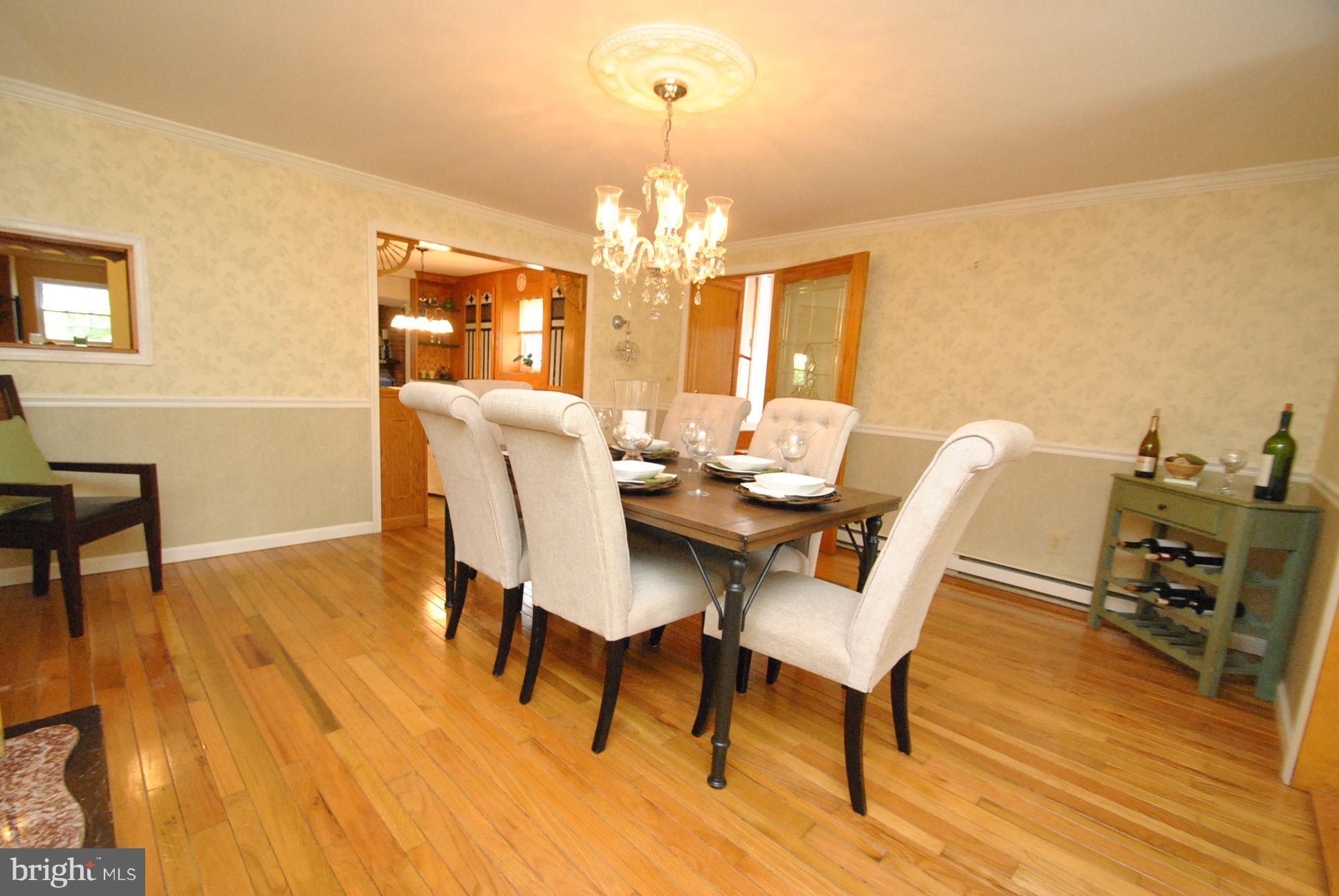 9620 Dundawan Road Baltimore, MD 21236 - Photo 23 of 30 FORMAL DINING ROOM WITH FRENCH DOORS