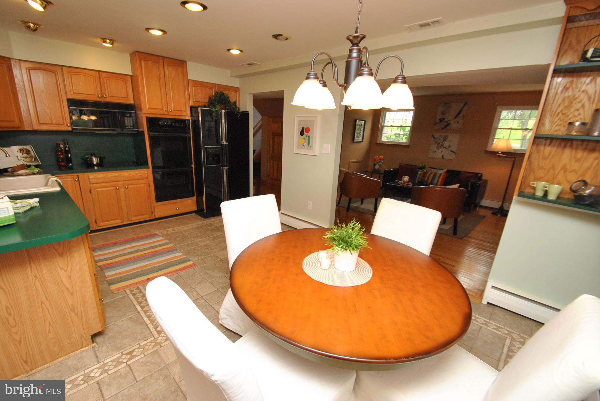 9620 Dundawan Road Baltimore, MD 21236 - Photo 24 of 30 CUSTOM GOURMET KITCHEN WITH EXTRA TABLE SPACE