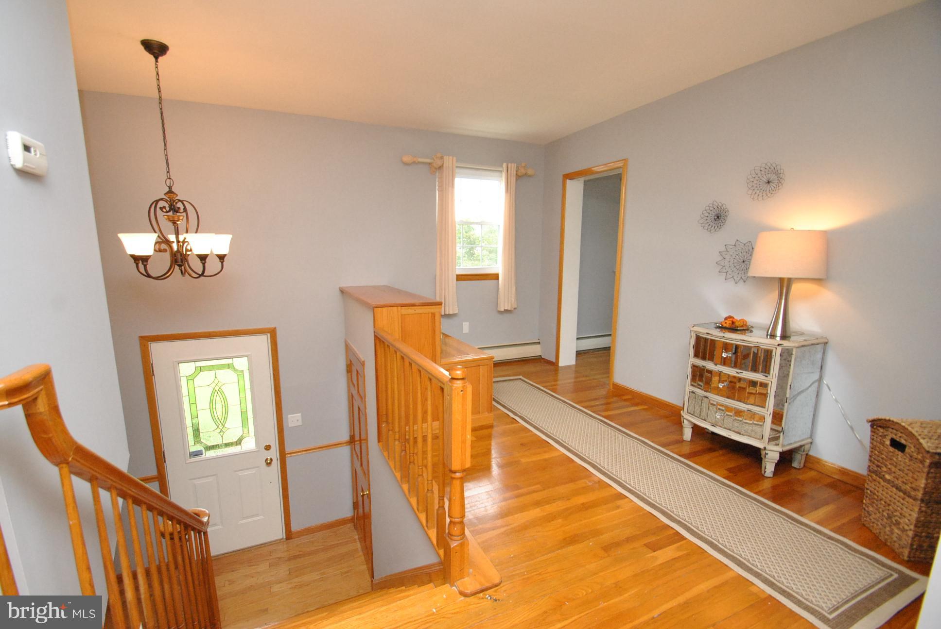 9620 Dundawan Road Baltimore, MD 21236 - Photo 6 of 30 ENTRANCE / FOYER VIEW FROM UPPER LEVEL
