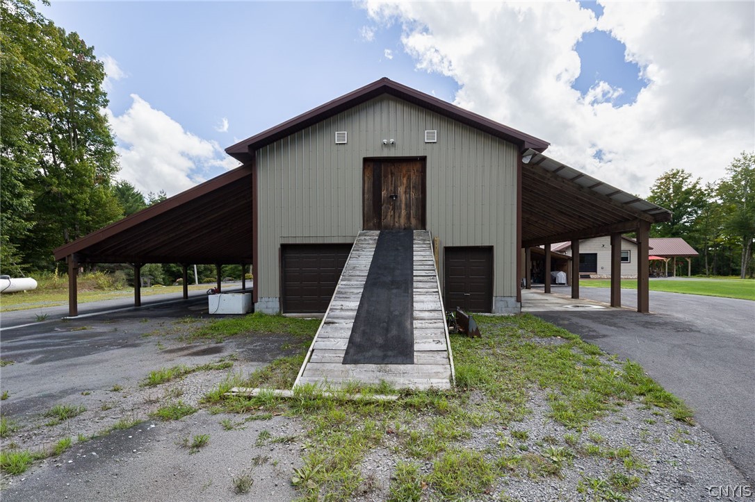 5117 Pleasant Valley Road North Greig, NY 13312 - Photo 42 of 49 Snowmobile or ATV storage. Drive up ramp with double door 6.5'wide X 7.5' height