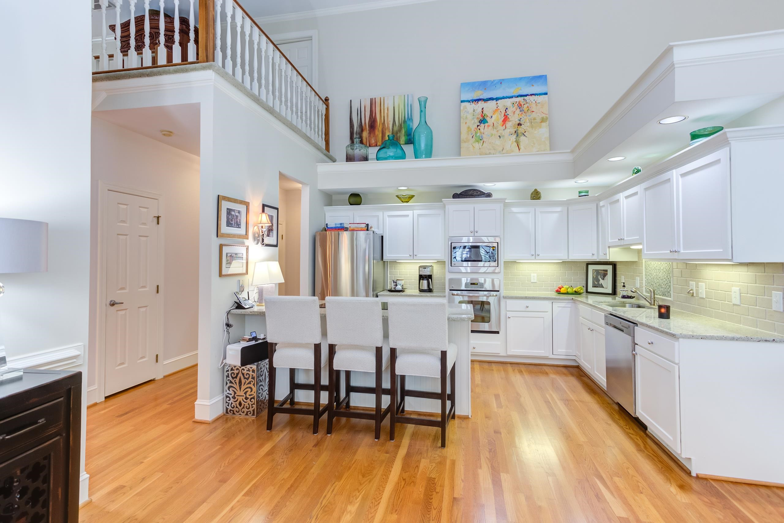 2913 Hawtree Drive Raleigh, NC 27613 - Photo 9 of 28 Plenty of cabinetry and counter work space, plus an island with room for stools. Kitchen