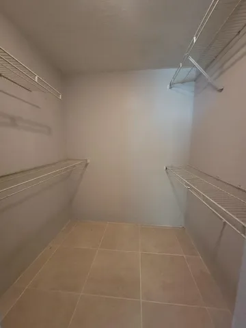 a view of a room with racks on the wall