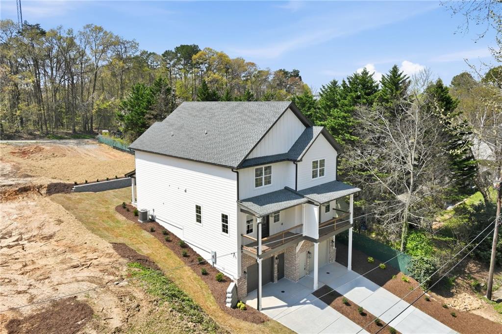 1121 Riverside Terrace Gainesville, GA 30501 - Photo 2 of 39 a aerial view of a house with a yard