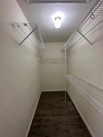 a view of a room with racks on the wall