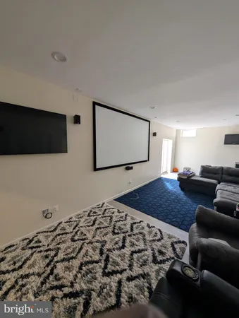 a bedroom with bed and mirror
