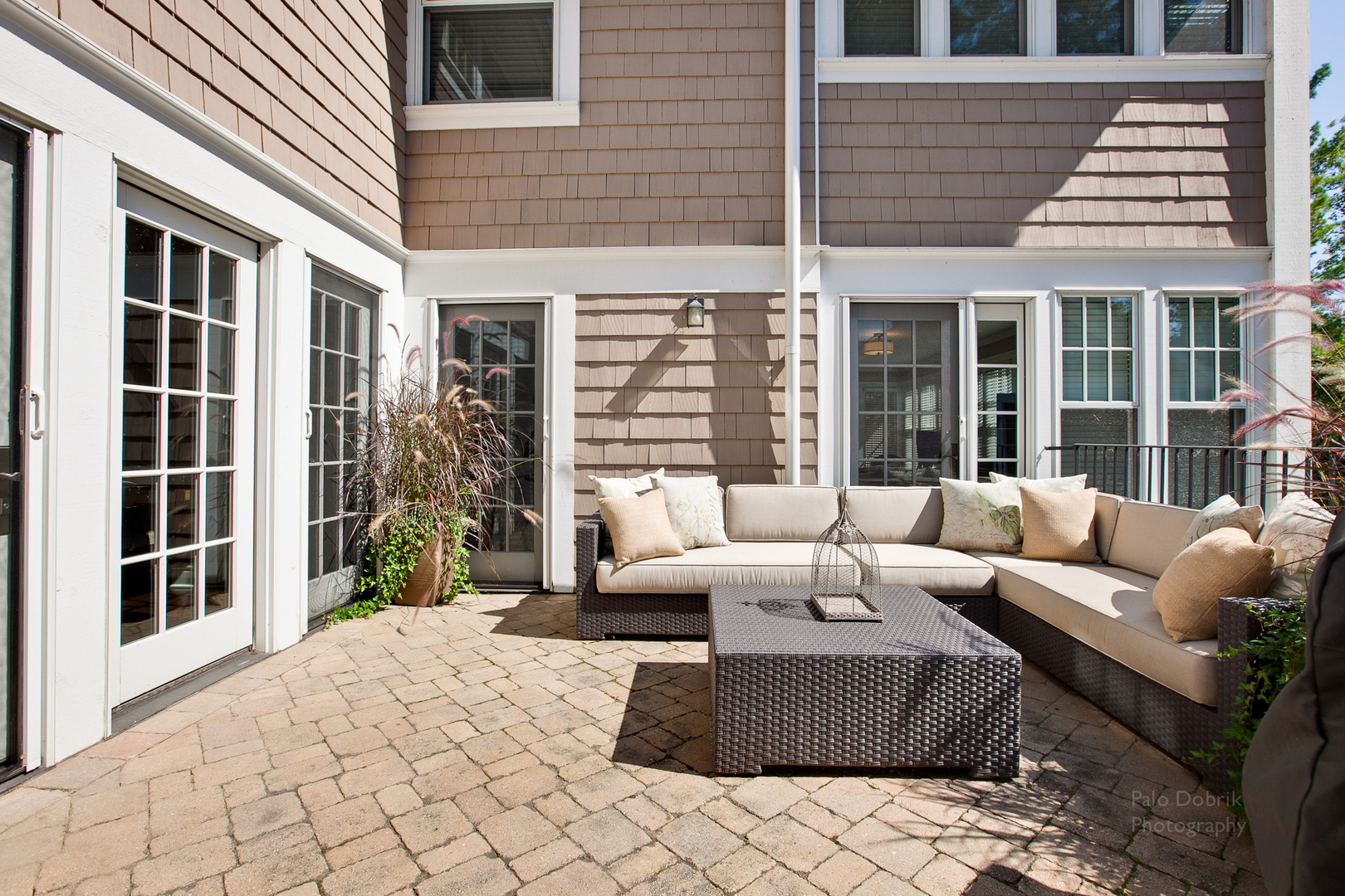 231 Franklin Road Glencoe, IL 60022 - Photo 5 of 49 a view of a patio with couches table and chairs and potted plants