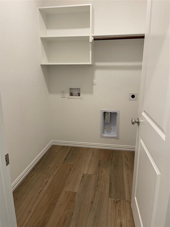 1204 Sequoia Lane Princeton, TX 75407 - Photo 18 of 20 a view of a small space with wooden floor and a window