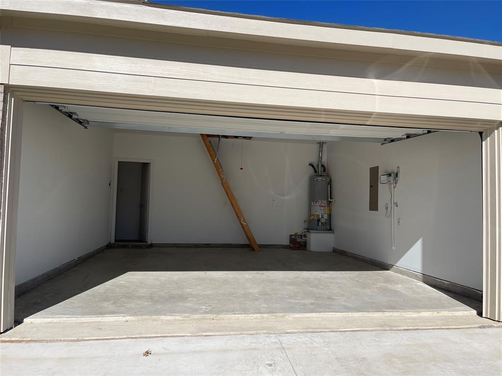 1204 Sequoia Lane Princeton, TX 75407 - Photo 8 of 20 a view of a garage