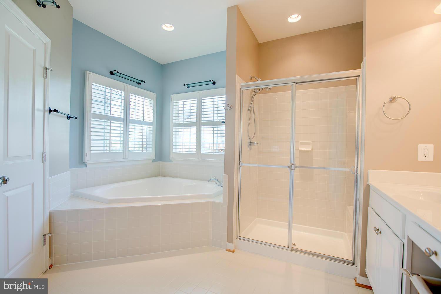 141 Short Branch Road Stafford, VA 22556 - Photo 18 of 30 a bathroom with a bathtub and a shower